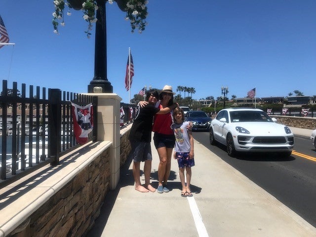 Devin with sons George Ryan and Jack Sky, enjoying a day on Balboa Island.