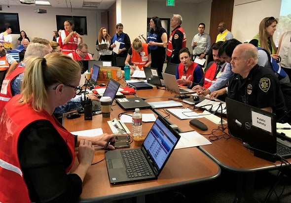 Staff and volunteers in the Campus Emergency Operations Group staff the Emergency Operations Center during an incident.