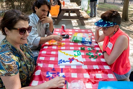 Playing Blokus during the games hour. From left: Tammy Thompson, Alex Caro, and Sylvia Condro