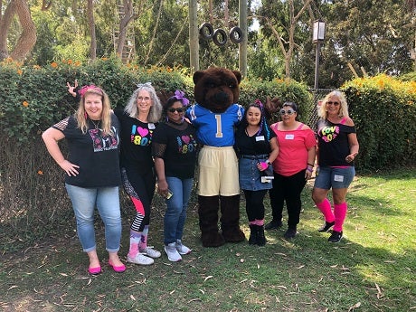 IT Services staff pose with Joe Bruin at the picnic.