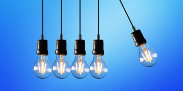 hanging lightbulbs against blue background