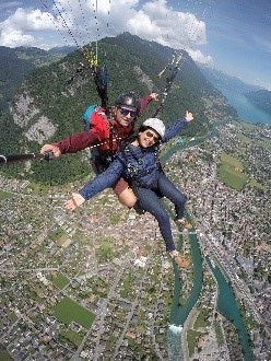 While on vacation, Neetika enjoyed paragliding in Switzerland.